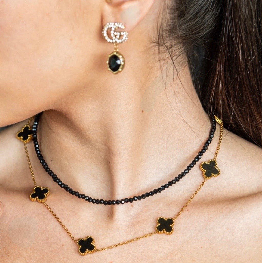 multi clover necklace black and gold 