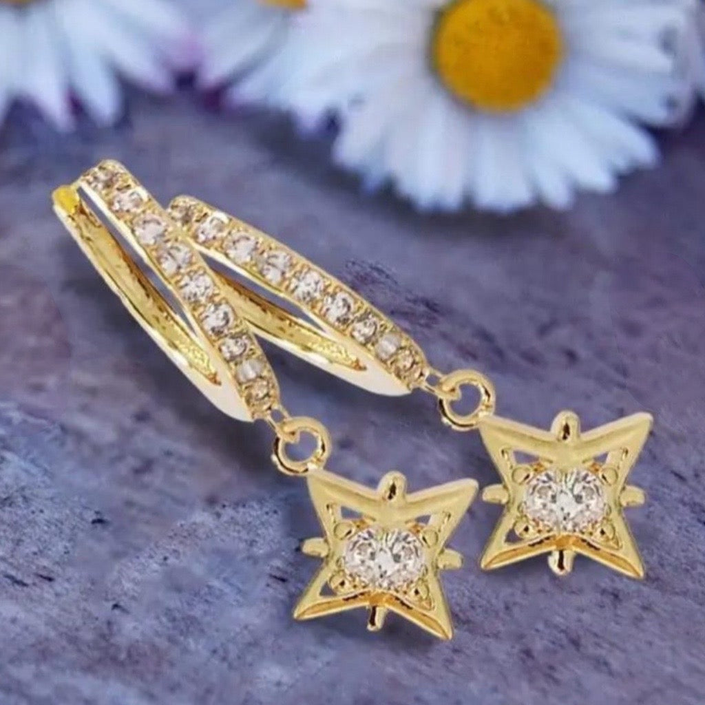 star charm huggie earrings with cubic zirconias